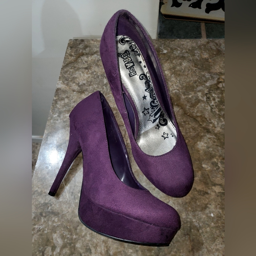 Purple closed toe pumps